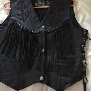 Black fringed leather vest with purple rose inlays